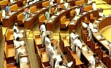 Solar scam rocks Kerala Assembly, House adjourns after LDF protest Opposition protests against Kerala CM Oommen Chandy over Solar Scam issue. Photo: ANI