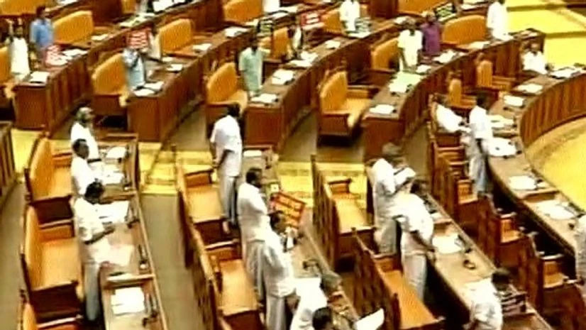 Opposition protests against Kerala CM Oommen Chandy over Solar Scam issue. Photo: ANI Opposition protests against Kerala CM Oommen Chandy over Solar Scam issue. Photo: ANI
