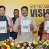 Union Minister for Petroleum and Natural Gas Dharmendra Pradhan (M) along with Union Minister of State (I/C ) for Sports and Youth Affairs Sarbananda Sonowal (2nd L) and BJP MP Bijoya Chakraborty (2nd R)   releasing the Hydrocarbon Vision Document 20