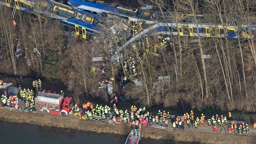 Aerial view of rescue forces working at the site of a train accident near Bad Aibling, Germany. Several people were killed when two trains collided head-on Aerial view of rescue forces working at the site of a train accident near Bad Aibling, Germany. Several people were killed when two trains collided head-on