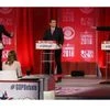 Republican presidential candidates former Governor Jeb Bush (L) and businessman Donald Trump (R) speak at the same time as they debate the record of Bush's brother, former President George W. Bush, as Senator Ted Cruz (C) looks on at the Republican U