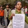 JNU teachers & students form a human chain inside the campus in protest against arrest of JNUSU President Kanhaiya Kumar, in New Delhi. Photo: PTI
