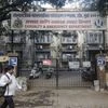 A pedestrian walks past the Lokmanya Tilak Municipal General Hospital in Mumbai. Photo: Reuters