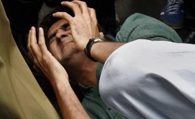 PM Modi calls meeting of political parties; discuss JNU issue A police man tries to save a JNU student who was being beaten up during a clash between the advocates and the students outside the Patiala House Courts in New Delhi. PTI Photo by Atul Yadav