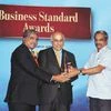 Motherson Sumi Chairman Vivek Chaand Sehgal (centre) receives the CEO of the Year award from former UIDAI chief Nandan Nilekani (left) and Defence Minister Manohar Parrikar