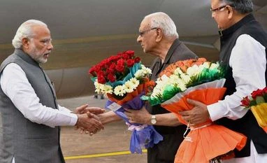 PM Modi launches Rurban Mission from Chhattisgarh PM Narendra Modi being received at Raipur airport on Sunday, Feb 21, 2016 PTI