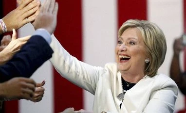Clinton has delegates to win Democratic nomination: AP survey Democratic presidential candidate Hillary Clinton reacts to supporters as she arrives to address supporters at her Super Tuesday election night rally in Miami. Photo: PTI