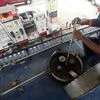 An employee measures diesel in a tanker before unloading at a fuel station in Kolkata. Photo: Reuters