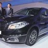 Suzuki Executive Vice-president T Suzuki (left)  and Maruti Suzuki MD &amp; CEO  Kenichi Ayukawa at the launch of the S-Cross at the  2014 Auto Expo