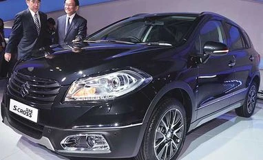 How Maruti Suzuki is putting S-Cross back on track Suzuki Executive Vice-president T Suzuki (left) and Maruti Suzuki MD & CEO Kenichi Ayukawa at the launch of the S-Cross at the 2014 Auto Expo