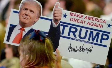 Newcomers may win us elections easily: Donald Trump A young supporter holds up a campaign sign for U.S. Republican Presidential candidate Donald Trump at Madison Central High School during at a campaign rally in Madison, Mississippi
