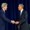 President Barack Obama, is introduced by Secretary of State John Kerry, left, before speaking at the Chief of Missions Conference at the State Department in Washington