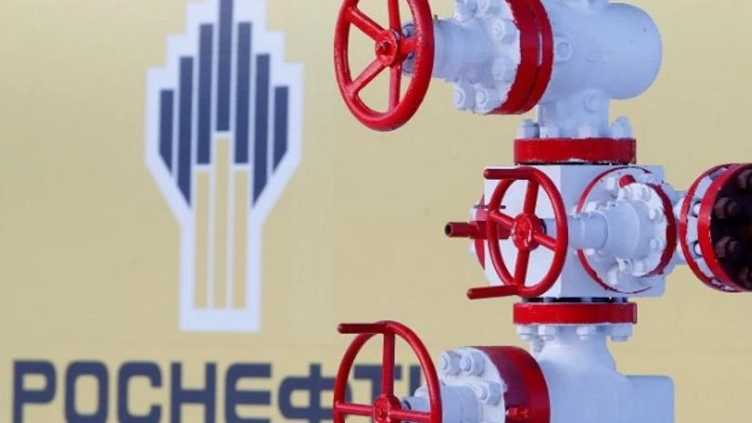 The logo of the Russian state oil company Rosneft is pictured behind a pipe at the Samotlor oil field outside the West Siberian city of Nizhnevartovsk, Russia The logo of the Russian state oil company Rosneft is pictured behind a pipe at the Samotlor oil field outside the West Siberian city of Nizhnevartovsk, Russia