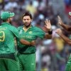 Pakistan's skipper Shahid Afridi celebrates with his team-mates after taking a wicket against Bangladesh during World Cup T20 match at Eden Gardens in Kolkata