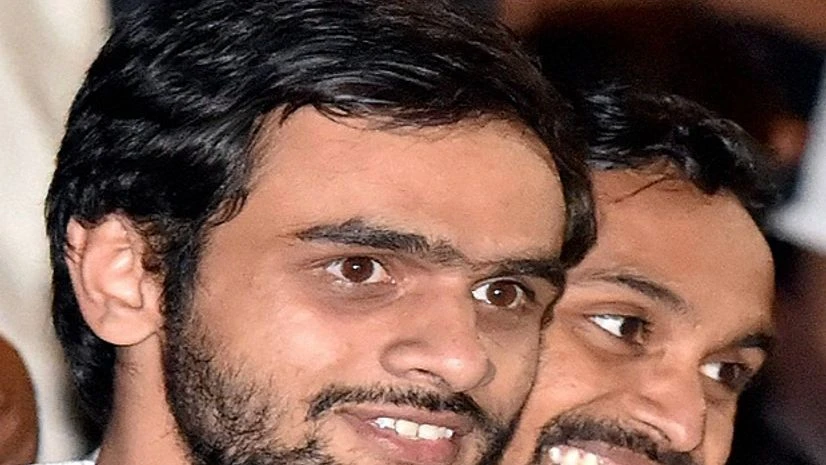 JNU students Umar Khalid (L) and Anirban Bhattacharya at JNU campus, after Delhi's Patiala House Court on Friday granted six-month interim bail to Anirban and Umar, slapped with sedition charges JNU students Umar Khalid (L) and Anirban Bhattacharya at JNU campus, after Delhi's Patiala House Court on Friday granted six-month interim bail to Anirban and Umar, slapped with sedition charges