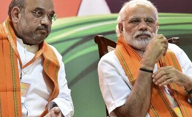 Modi govt established new benchmarks for development: Amit Shah A file photo of Prime Minister Narendra Modi and BJP President Amit Shah