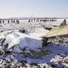 Emergencies Ministry members work at the crash site of a Boeing 737-800 Flight FZ981 operated by Dubai-based budget carrier Flydubai, at the airport of Rostov-On-Don, Russia