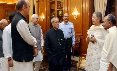 President Pranab Mukherjee meets members of Congress delegation at Rashtrapati Bhavan in New Delhi President Pranab Mukherjee meets members of Congress delegation at Rashtrapati Bhavan in New Delhi