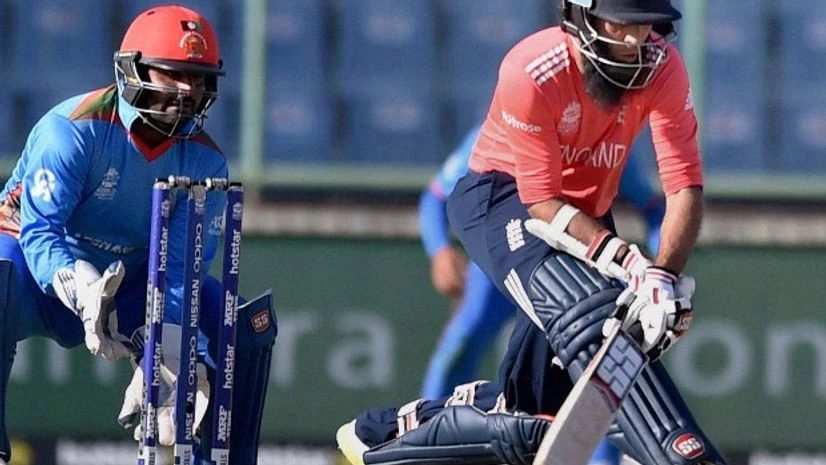 England's batsman Moeen Ali plays a shot during the World Cup T20 mach against Afghanistan at Firozshah Kotla in New Delhi England's batsman Moeen Ali plays a shot during the World Cup T20 mach against Afghanistan at Firozshah Kotla in New Delhi