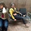 In this file photo, provided by Georgian Public Broadcaster and photographed by Ketevan Kardava shows Nidhi Chaphekar, right, a 40-year-old Jet Airways flight attendant from Mumbai being wounded in Brussels Airport, Brussels, Belgium