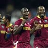 West Indies' players celebrate the victory during ICC WT20 Semi Final match against India at Wankhede Stadium in Mumbai. PTI Photo