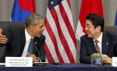 Barack Obama to make historic first presidential visit to Hiroshima President Barack Obama speaks with Japanese Prime Minister Shinzo Abe during their meeting with South Korean President Park Geun-hye at the Nuclear Security Summit PTI