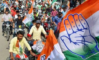 Appointing new CM in Gujarat not sufficient to change BJP's fortune: Congress Congress supporters take out a bike rally on last day of Assam assembly election campaign in Dibrugarh, Assam on Saturday, April 2, 2016 PTI