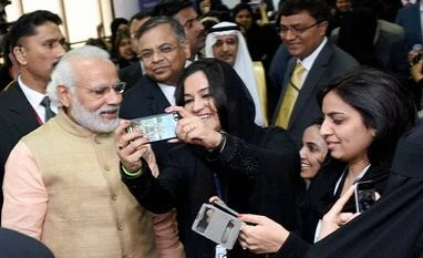 PM Modi visits TCS' all women centre in Riyadh Prime Minister Narendra Modi poses for a selfie with IT professionals working in TCS All Women IT & ITES Center during his visit to the Complex in Riyadh, Saudi Arabia