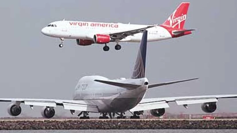 Alaska Air is set to pay between $56 and $58 per share to acquire Virgin America Alaska Air is set to pay between $56 and $58 per share to acquire Virgin America