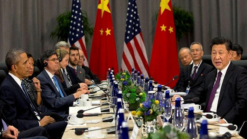 President Barack Obama listens at left as Chinese President Xi Jinping speaks during their meeting at the Nuclear Security Summit in Washington President Barack Obama listens at left as Chinese President Xi Jinping speaks during their meeting at the Nuclear Security Summit in Washington