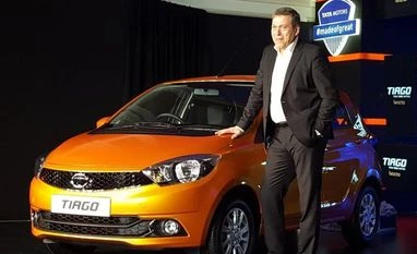 Tata Tiago trains guns on Maruti Celerio, Hyundai i10 Tata Motors CEO Guenter Butschek at the unveiling of hatchback Tiago. Photo: Tata Motors' Twitter handle
