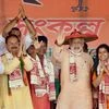Prime Minister Narendra Modi  is being feliciated with a assamese japi during an election rally at Raha, Nagaon district in Assam