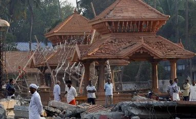 All party meeting decides not to ban firework display in Kerala People check out the damaged structures after a massive fire broke out Sunday during a fireworks display at the Puttingal temple complex in Paravoor village, Kollam district