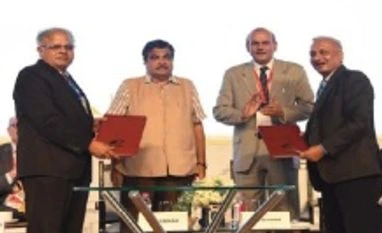 BEML ventures into dredging business BEML and DCI Ltd officials sign the MoU in the presence of Nitin Gadkari