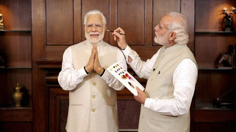 Prime Minster Narendra Modi with his wax statue due to be placed at London's Madame Tussauds museum in New Delhi. Prime Minster Narendra Modi with his wax statue due to be placed at London's Madame Tussauds museum in New Delhi.