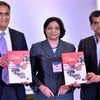 United States Ambassador to India Richard Verma with Chief Executive Officer (CEO) of Niti Aayog Amitabh Kant releases a publication during the 24th Annual Meeting of American Chamber Of Commerce In India, in New Delhi