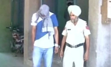 Youth charged with rape and abduction of Dalit woman surrenders: Police The accused was arrested in a kidnapping and rape case at Muktsar, Punjab. Photo: ANI