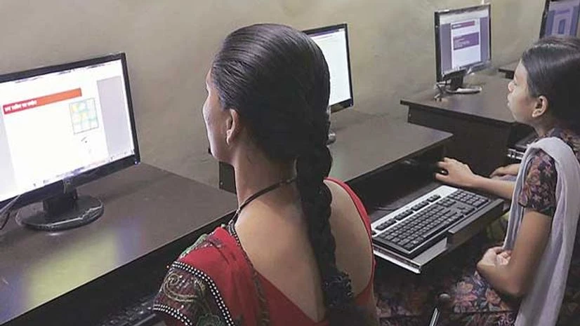 Women attend a class at the Nasscom-aided National Digital Literacy Mission centre in Gurgaon Women attend a class at the Nasscom-aided National Digital Literacy Mission centre in Gurgaon