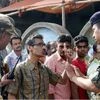 A voter argues with Central Force Jawans near a polling station during 4th phase of West Bengal Assembly elections in North 24 Pargana on Monday. PTI Photo by Ashok Bhaumik