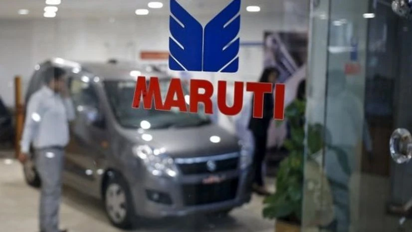 The logo of Maruti Suzuki India Limited is seen on a glass door at a showroom in New Delhi The logo of Maruti Suzuki India Limited is seen on a glass door at a showroom in New Delhi