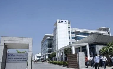 HCL Technologies to set up operations in AP with Rs 500 cr investment People walk in front of the HCL Technologies Ltd office at Noida, on the outskirts of New Delhi
