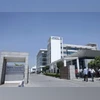 People walk in front of the HCL Technologies Ltd office at Noida, on the outskirts of New Delhi People walk in front of the HCL Technologies Ltd office at Noida, on the outskirts of New Delhi