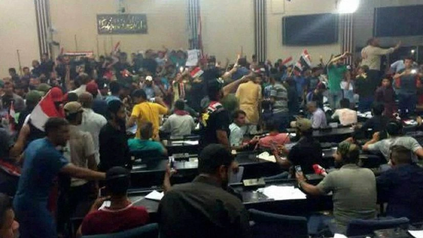 Supporters of Shiite cleric Muqtada al-Sadr storm parliament in Baghdad's Green Zone Supporters of Shiite cleric Muqtada al-Sadr storm parliament in Baghdad's Green Zone