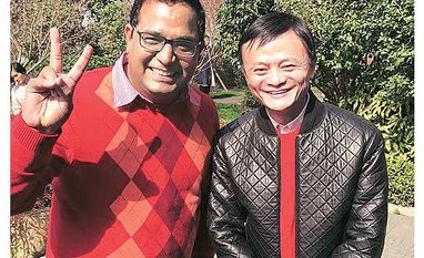 Ride with Uber abroad as Paytm partners with Alipay to go global Paytm's Vijay Shekhar Sharma with Alibaba's Jack Ma