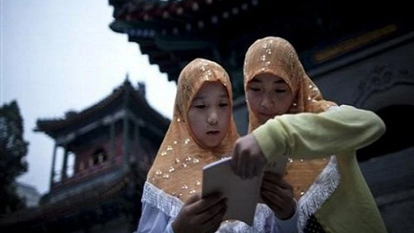 Chinese province bans Islamic activity in schools Chinese province bans Islamic activity in schools
