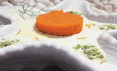 Jalebi caviar, saffron glaze with pistachio rabdi Jalebi caviar, saffron glaze with pistachio rabdi