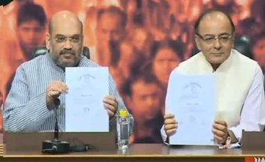 Amit Shah and Arun Jaitley, as they announce that PM Modi's educational degrees will be available in public domain Amit Shah and Arun Jaitley, as they announce that PM Modi's educational degrees will be available in public domain