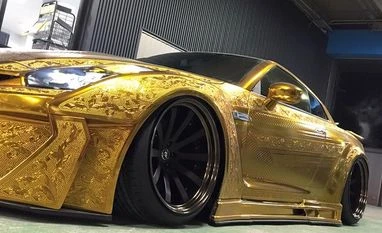 $1 million gold-plated car on display in Dubai Image Courtesy: Al Arabiya