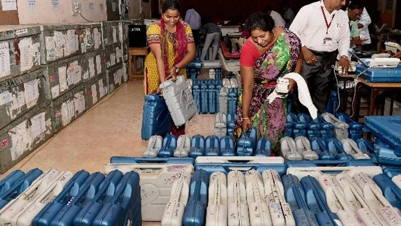 EVMs tamper-proof as ever, asserts Election Commission Polling officials check the Electronic Voting Machines (EVM) at a distribution centre ahead of voting for Tamil Nadu assembly polls, in Chennai