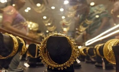 Rajesh Exports wins export order worth Rs 1,053 crore Gold bracelets are on display as a woman (L) makes choices at a jewellery showroom on the occasion of Akshaya Tritiya, a major gold buying festival, in Kolkata